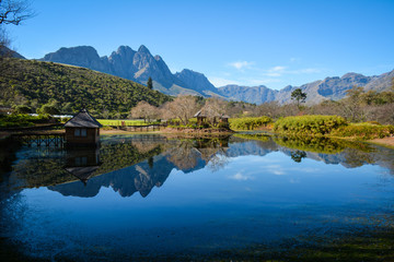 Obraz premium beautiful view of lake in the mountains from a South African wine tasting Vineyard