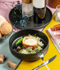 kyiv cotlete with vegetables on the table