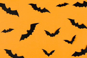 Obraz na płótnie Canvas halloween decorations concept, many black paper bats