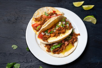 Mexican quesadillas with shredded pork also called 