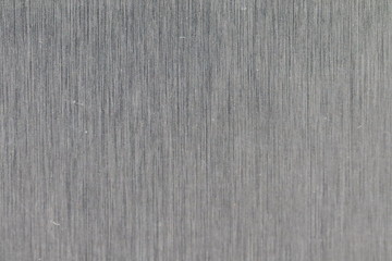 Texture métal gris foncé avec rayures verticales 