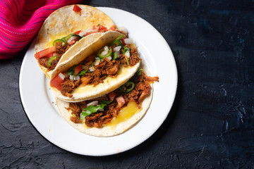 Mexican quesadillas with shredded pork also called 
