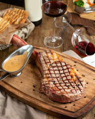 rib eye steak on wooden board 1