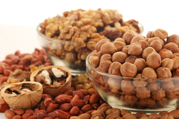 Different nuts in glass cups	