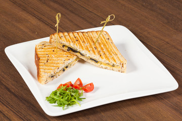 Club sandwich with cheese and olives