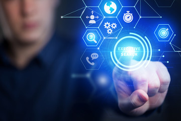 The concept of business, technology, the Internet and the network. A young entrepreneur working on a virtual screen of the future and sees the inscription: executive search.