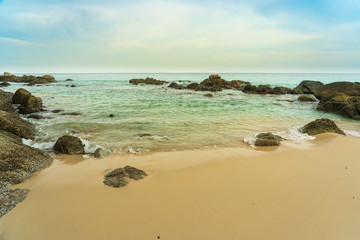 Seashell rocks beach millions of years old on the coast at Phuket Thailand.