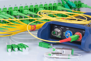 Optical Power Meter and Netwok of Fiber Patch Cord with Distribustion Frame Closeup