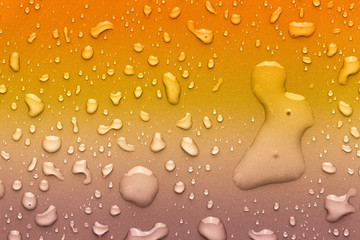 Drops of water on a color background