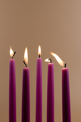 Burning candles with moving fire, spiritual concept