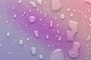 Drops of water on a color background