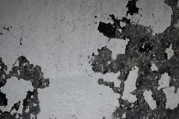 Texture of old cracked wall with white paint