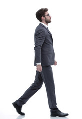 side view confident businessman goes forward.