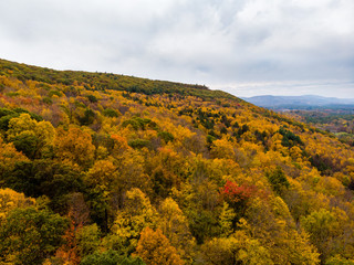 Fototapeta na wymiar Drone photo of peak foliage upstate New York during the autumn fall season.