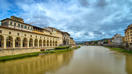 Fototapeta na wymiar The bridge Ponte Alle Grazie over the Arno River. View from Ponte Vecchio. Florence, Italy.