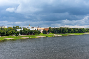 Fototapeta premium Summer panoramic view of the embankment of Volga River with the Church of the Three Confessors in Tver, Russia.
