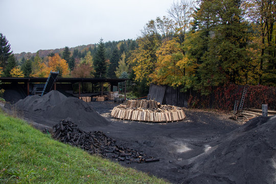 Charcoal pile prepared for churning