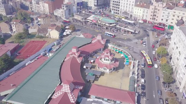 Fantastic aerial tilting shot of Zeleni Venac station and market in Belgrade centre