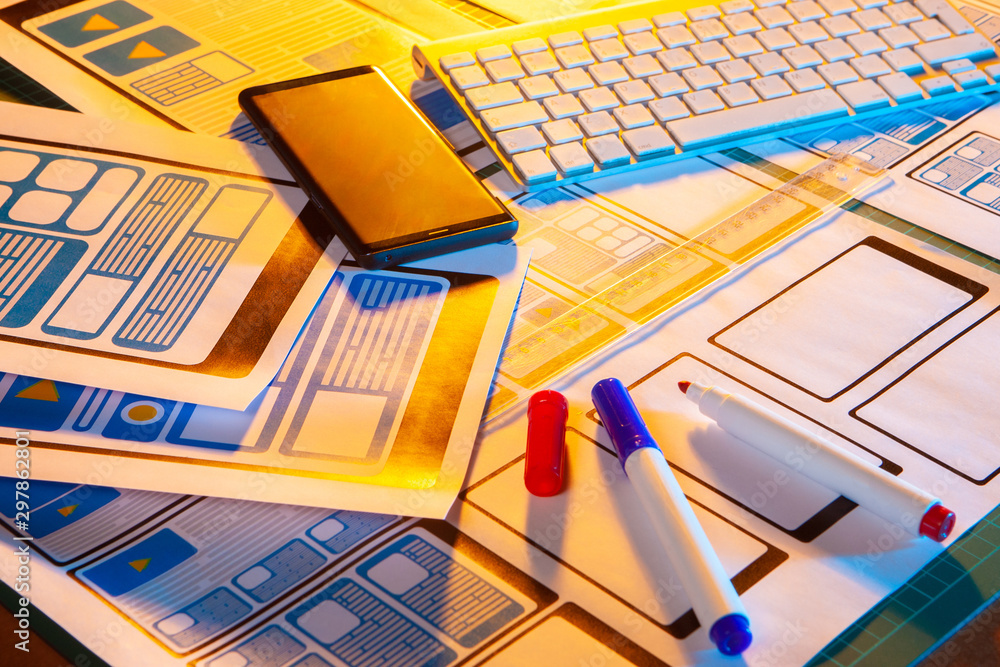 Poster layout interface app on the desktop. smartphone designer. application architecture. markers on the d