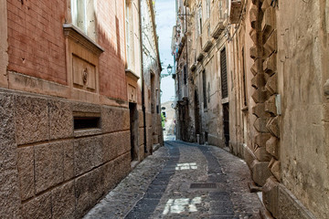 Fototapeta na wymiar A small street in the place Tropea in Italy
