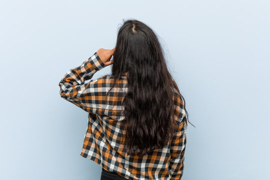 Young Cool Indian Woman From Behind Thinking About Something.