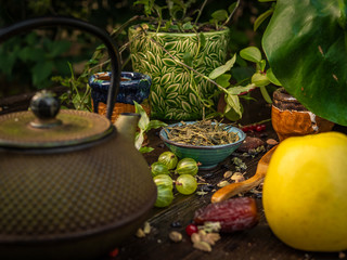 Preparation of the tea ceremony, tea in the bowl. Handmade cups