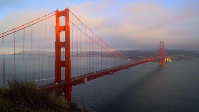 San Francisco Golden Gate Bridge with Speedboat passing through