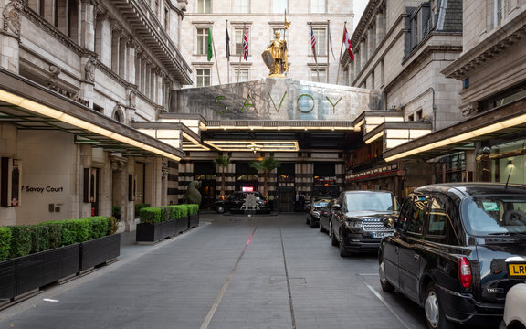 The Savoy, London. The façade and entrance to the exclusive luxury hotel situated off The Strand in central London.