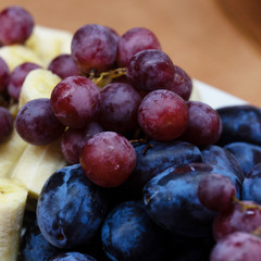 Assorted fruit - melon, banana, grapes. Fructarians food