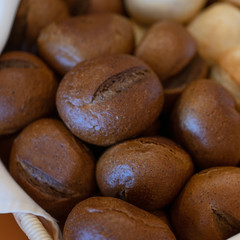 Bakery - dark crusty buns of bread in a basket