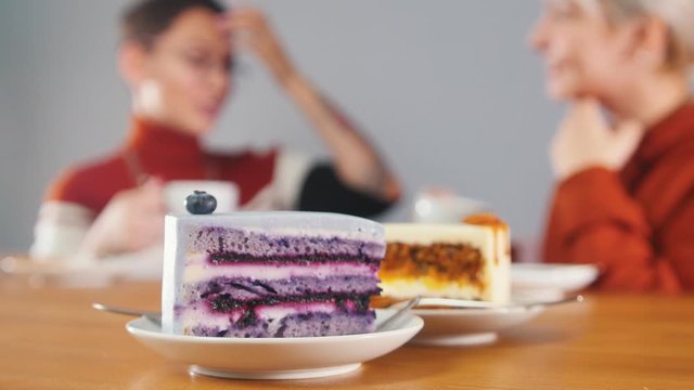 Pieces of cake are standing on the table