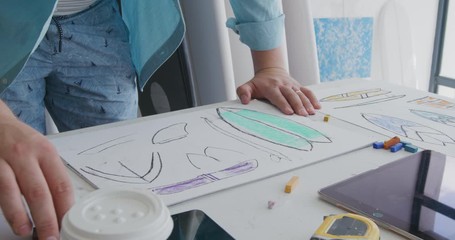 Male surfboard maker in his workshop - Powered by Adobe