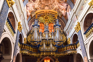 Fototapeta na wymiar Organ in Basilica of the Visitation of the Virgin Mary in Święta Lipka (Holy Lime). Warmian-Masurian voivodeship, Poland.