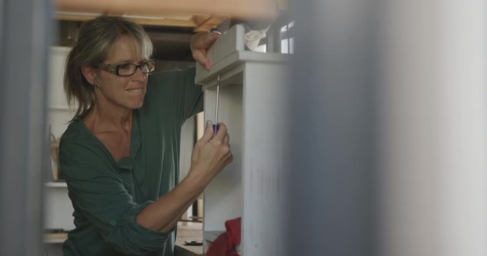 Woman doing DIY at home