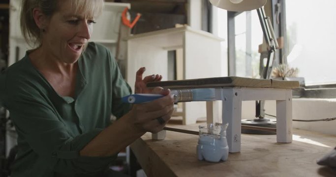 Woman doing DIY at home
