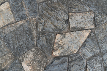 Tiles that are assembled into flooring for background and textured.