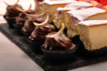 Sweet cookies, closeup of various kinds of cakes on event or wedding reception