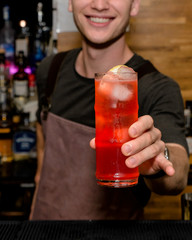 Professional bartender preparing cocktail at work. profession concept
