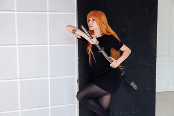 red-haired girl with a Japanese sword cosplayer anime Japan
