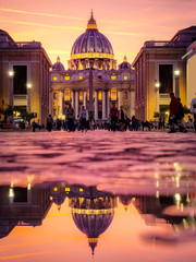 St. Peter's Basilica in the evening from Via della Conciliazione in Rome. Vatican City Rome Italy. Rome architecture and landmark. St. Peter's cathedral in Rome. Italian Renaissance church.
