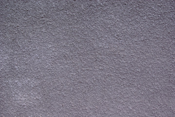 Close up abstract texture background, grey stucco top view.