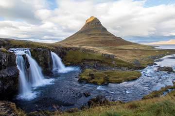 The most beautiful mountain in Iceland with waterfalls in the foreground