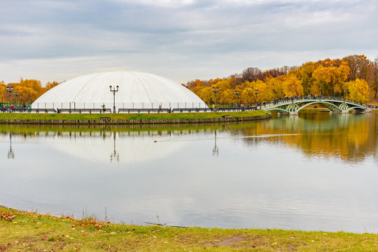 Protective dome over the light and music fountain on Podkova Island in Tsaritsyno Park in Moscow. Tsaritsyno Park in cloudy autumn day