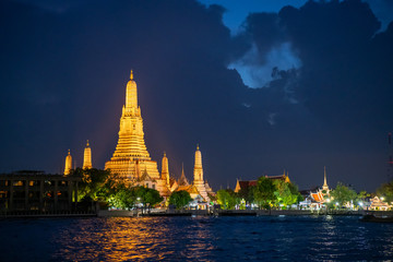 Twilight view of Wat Arun Ratchawararam temple. Along the Chao Phraya River - 297883892