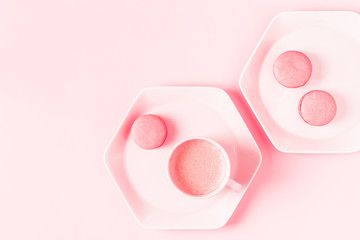 Breakfast with coffee on a pastel pink background
