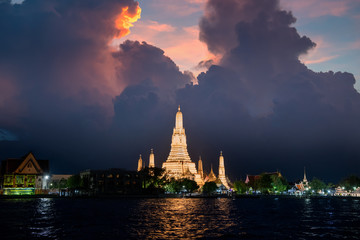 Twilight view of Wat Arun Ratchawararam temple. Along the Chao Phraya River - 297884858