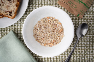 Dry oatmeal just poured in a bowl
