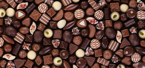 mix candy in white and dark chocolate, pastry food background