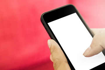 hand holding smart phone with blank screen.