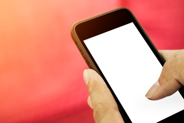 hand holding smart phone with blank screen.